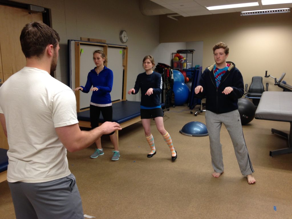 PT Doctoral Students at Carroll University practice Bear Rooting