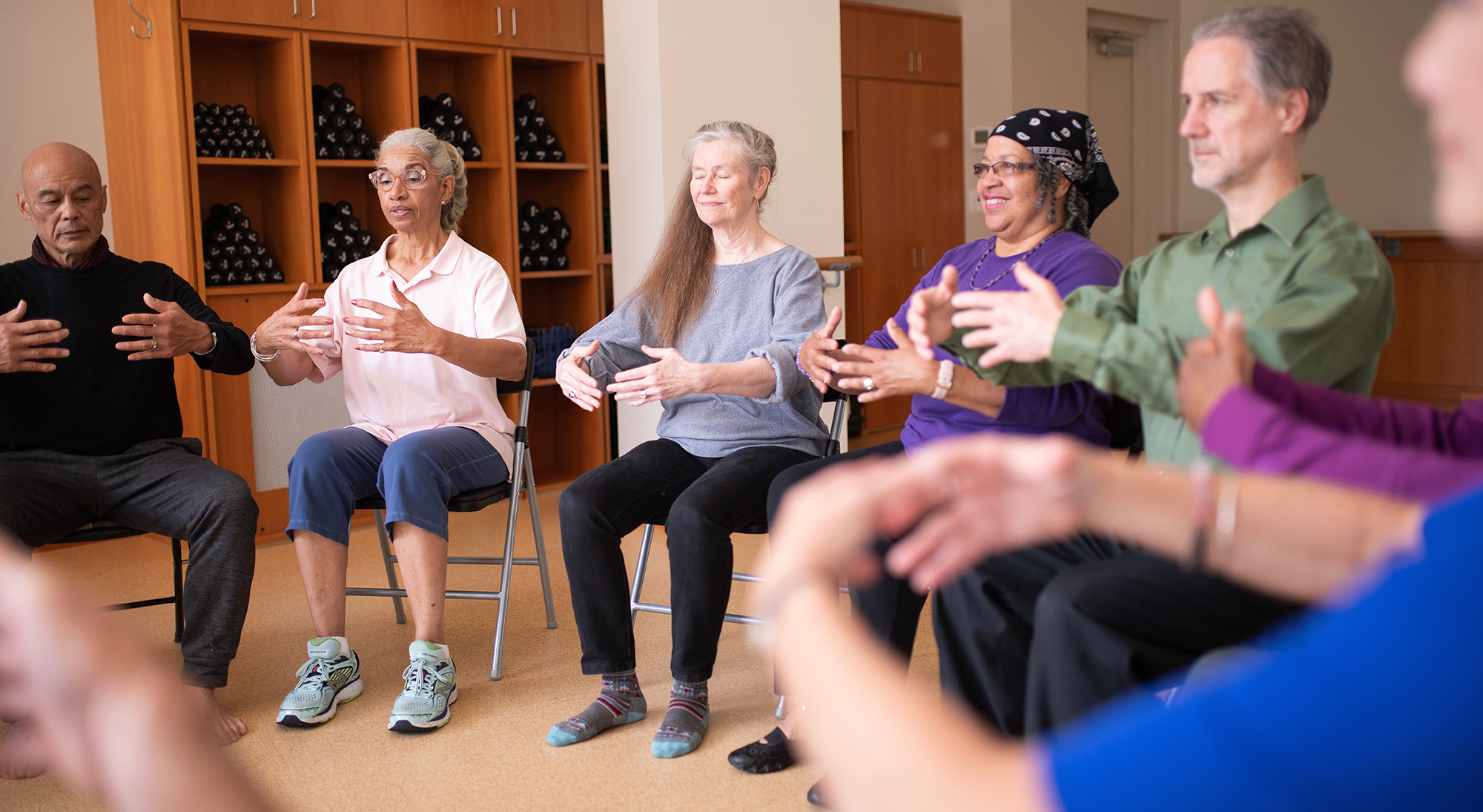 Seated Activities:  Class practices qi gong posture, Holding the Moon.