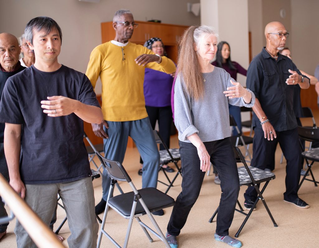 Participants practice Ward Off move